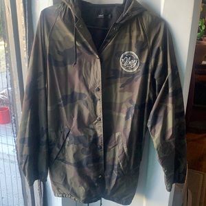 Fleece lined Obey wind breaker, bottom drawstrings